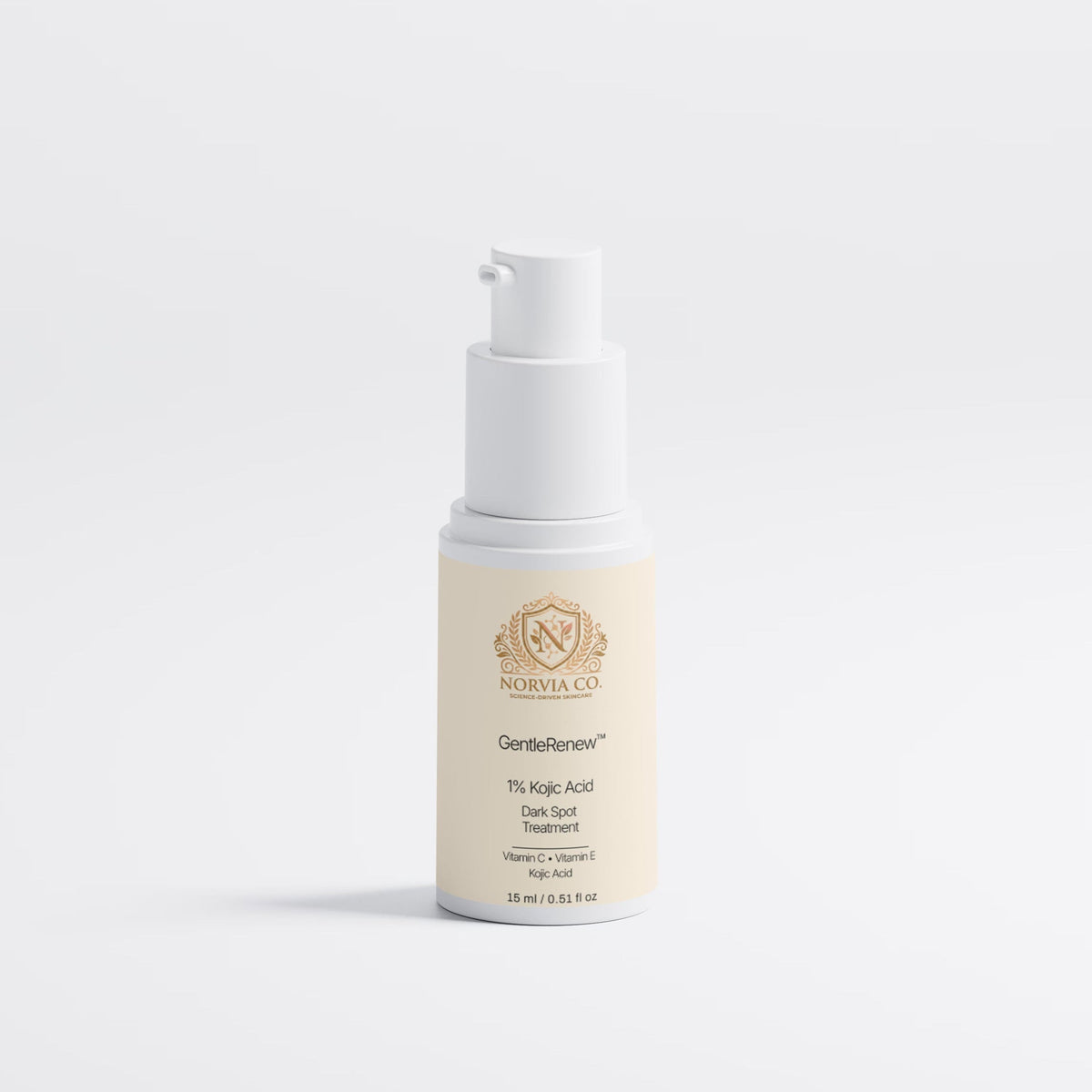 Skincare serum bottle with a white cap on a light gray background