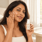 Dark spot treatment featuring 1 Kojic Acid in a white pump bottle, shown with a woman applying it to her cheek