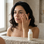 Woman patting Rested Eyes Dark Circle Cream under her eye