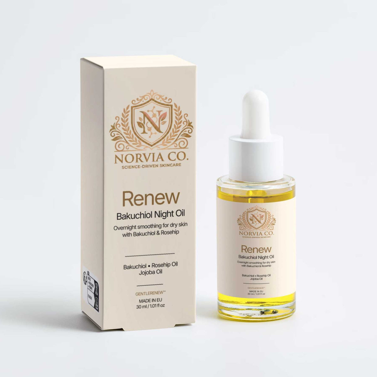 Norvia Co. Renew Bakuchiol Night Oil next to its cream-colored box on a light gray background