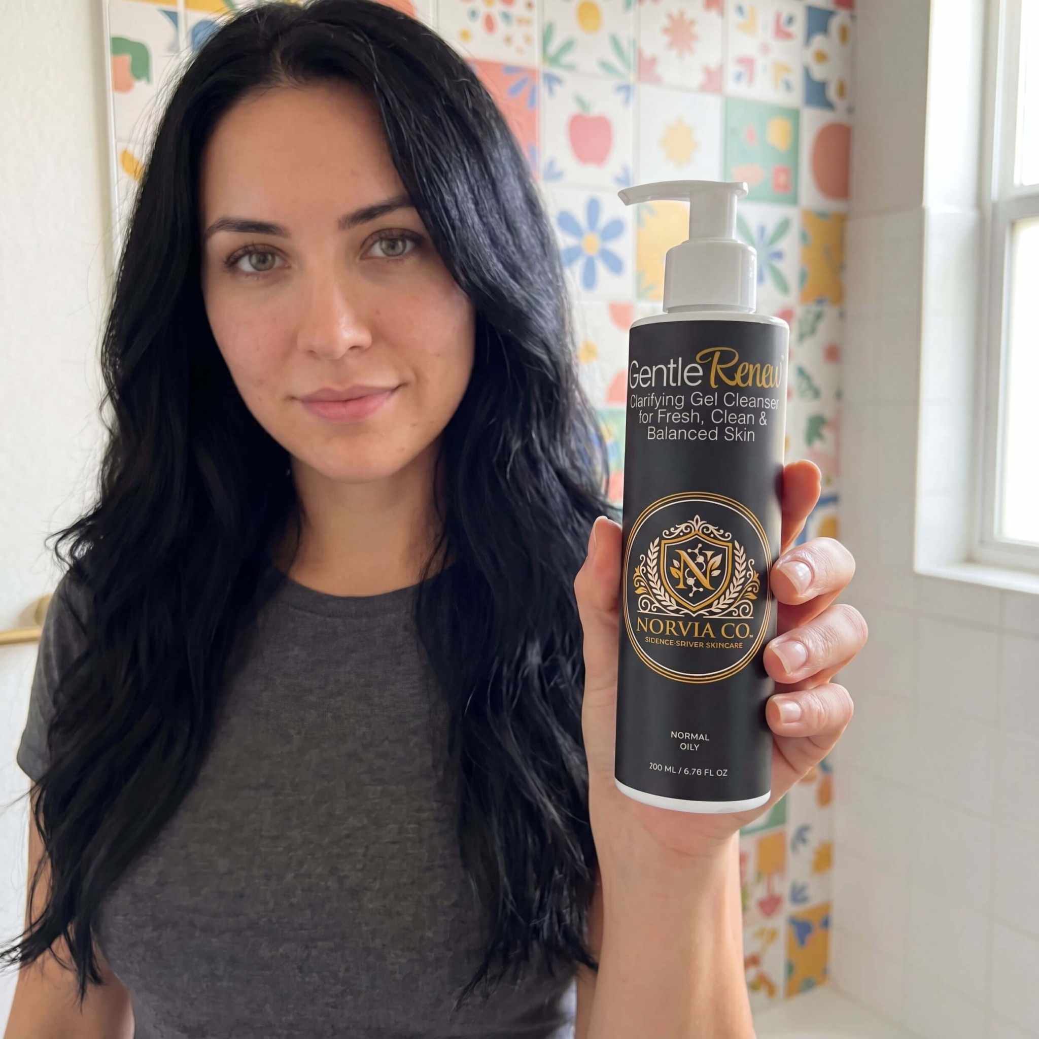 GentleRenew™ Clarifying Gel Cleanser bottle with aloe-based formula for gentle daily skin cleansing and oil removal