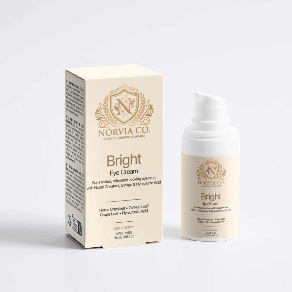 Brightening Eye Cream in a white pump bottle beside a cream-colored Norvia Co. carton with gold botanical detailing