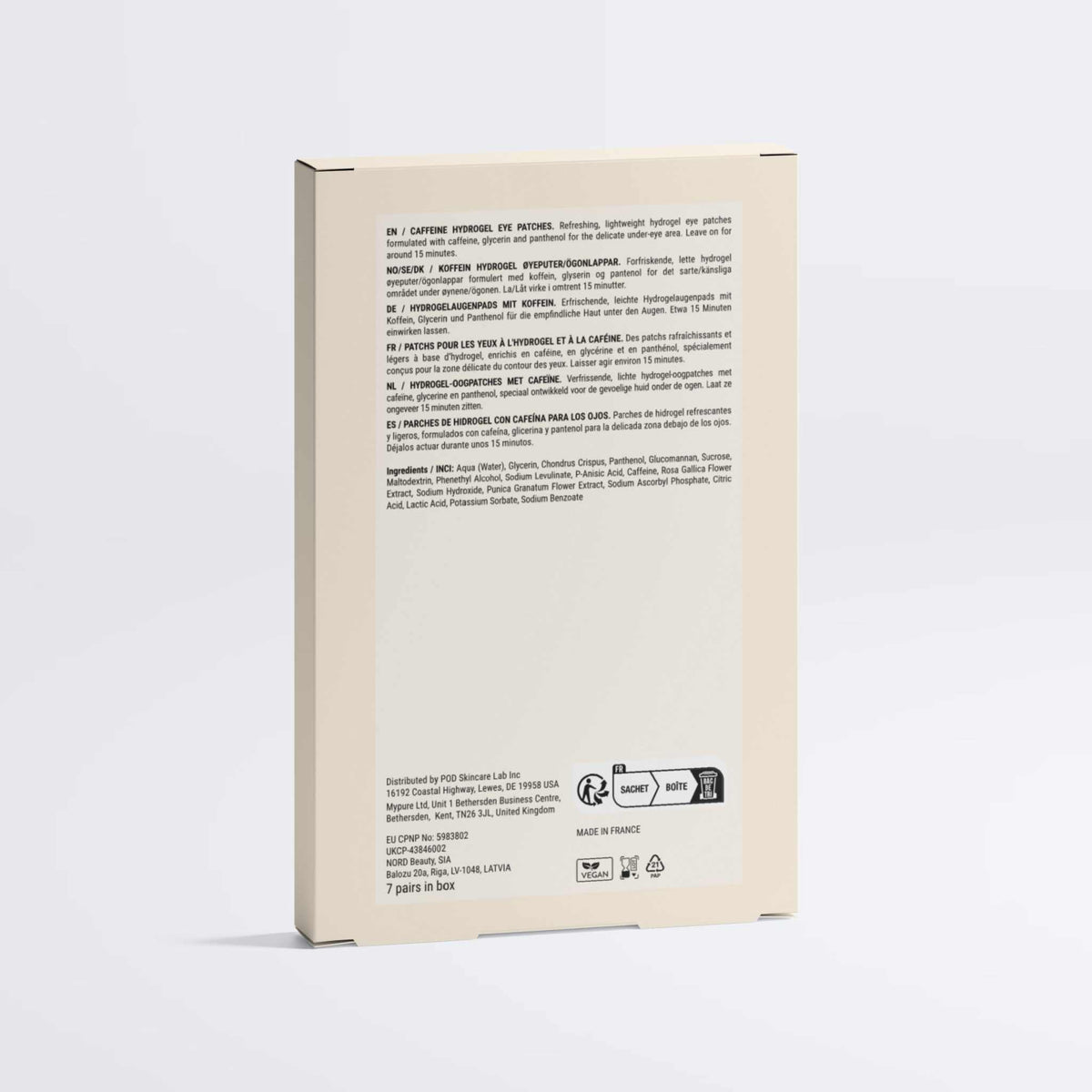 Caffeine Eye Patches in a beige rectangular carton, with dense multilingual product information and symbols printed on the back