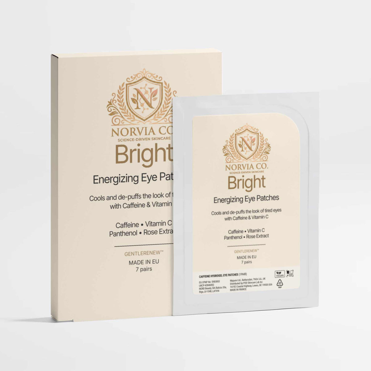 Caffeine Eye Patches in cream and white packaging, with gold Norvia branding and Bright Energizing Eye Patches labels