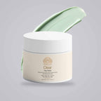 Clay Mask for Pores in a cream-colored jar with a white lid, paired with a pale green clay smear