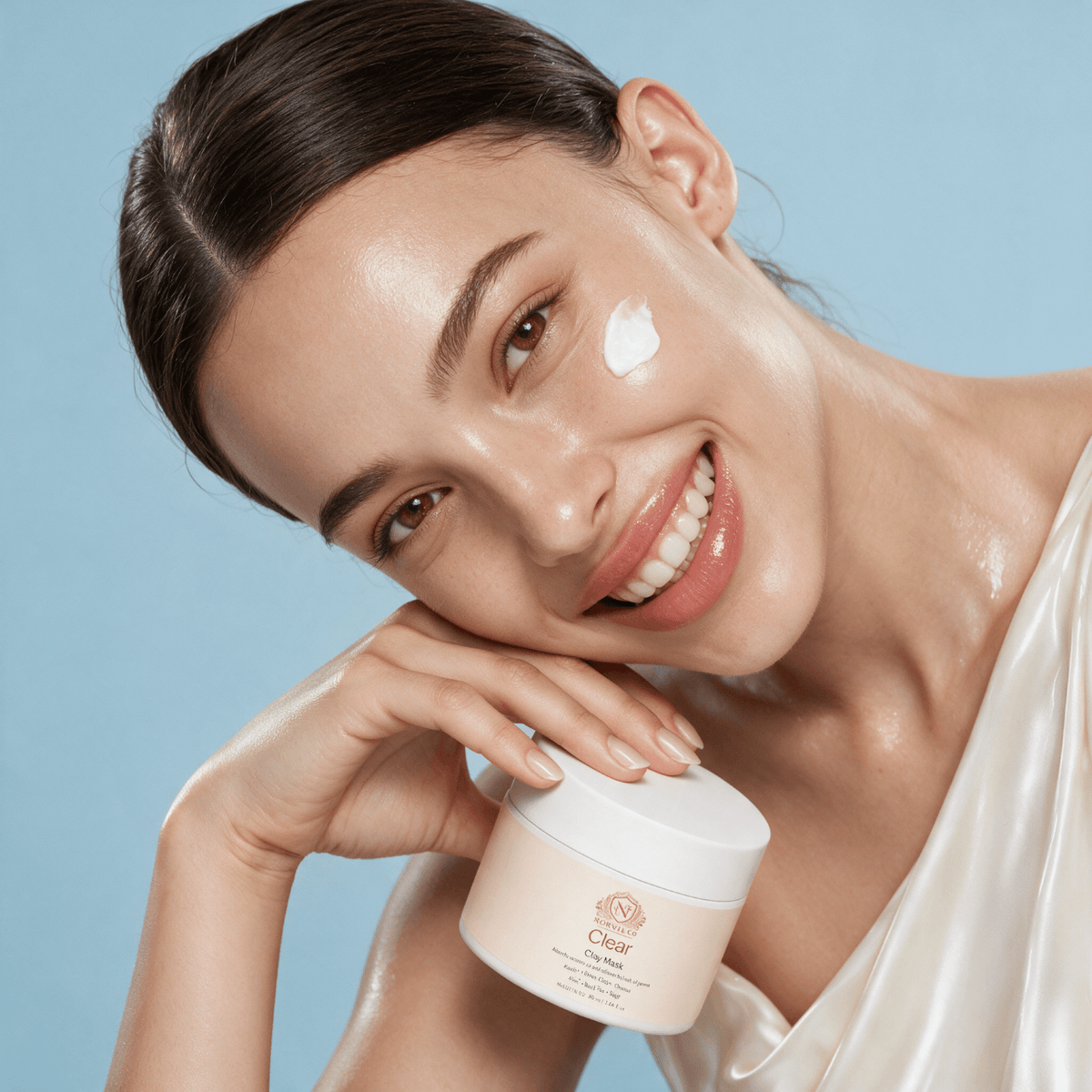 Clay Mask for Pores in a white jar with a creamy pale mask dab shown on skin; the jar has a minimalist label.