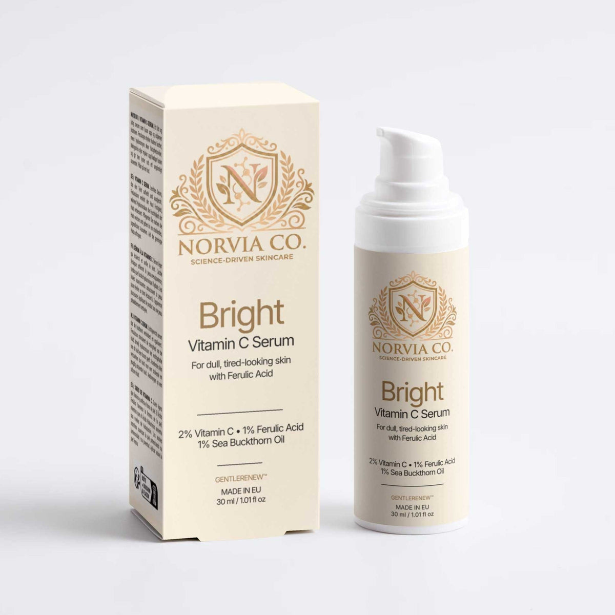 Bright Vitamin C serum set from the Even Tone Routine Set, with a cream box and white pump bottle in gold lettering.