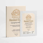 Eye Patches for Dark Circles in a white sachet with a beige and gold Rested Eyes carton, showing hydrogel patches