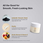 Face and Body Scrub in a pale cream jar with a white lid, shown alongside volcanic sand, kaolin and Nordic berries