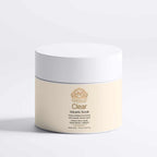 Face and Body Scrub in a pale cream jar with a white screw-top lid and gold Clear Volcanic Scrub label