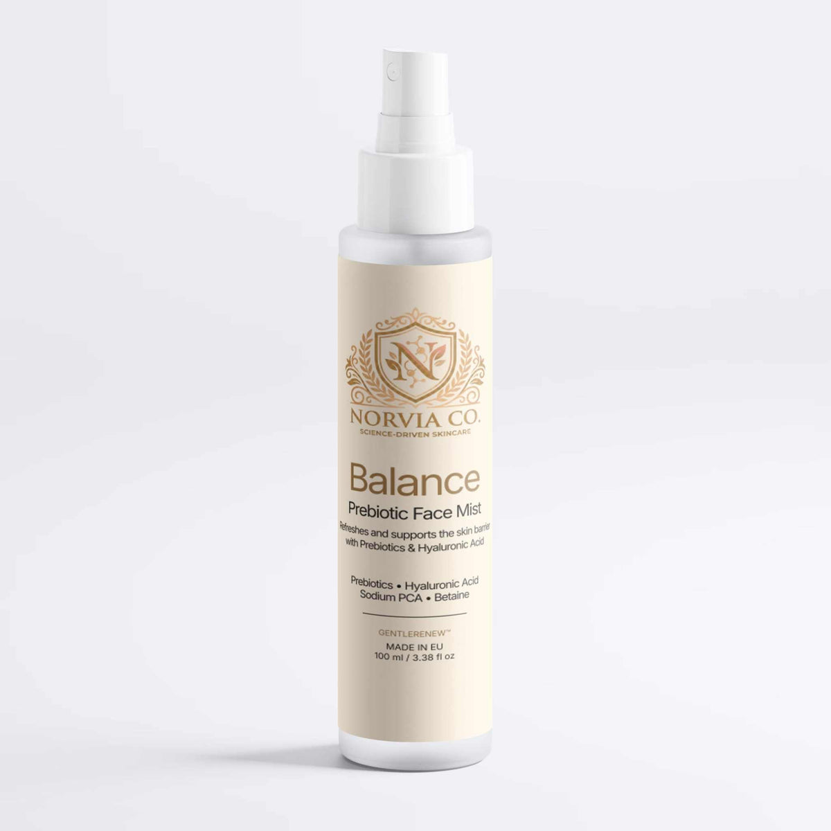 Facial Mist for Dry Skin in a slim cream bottle with a white spray nozzle and gold Norvia Balance label