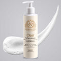Foam Cleanser for Oily Skin in a cream pump bottle with gold lettering, shown with a white airy mousse swirl.