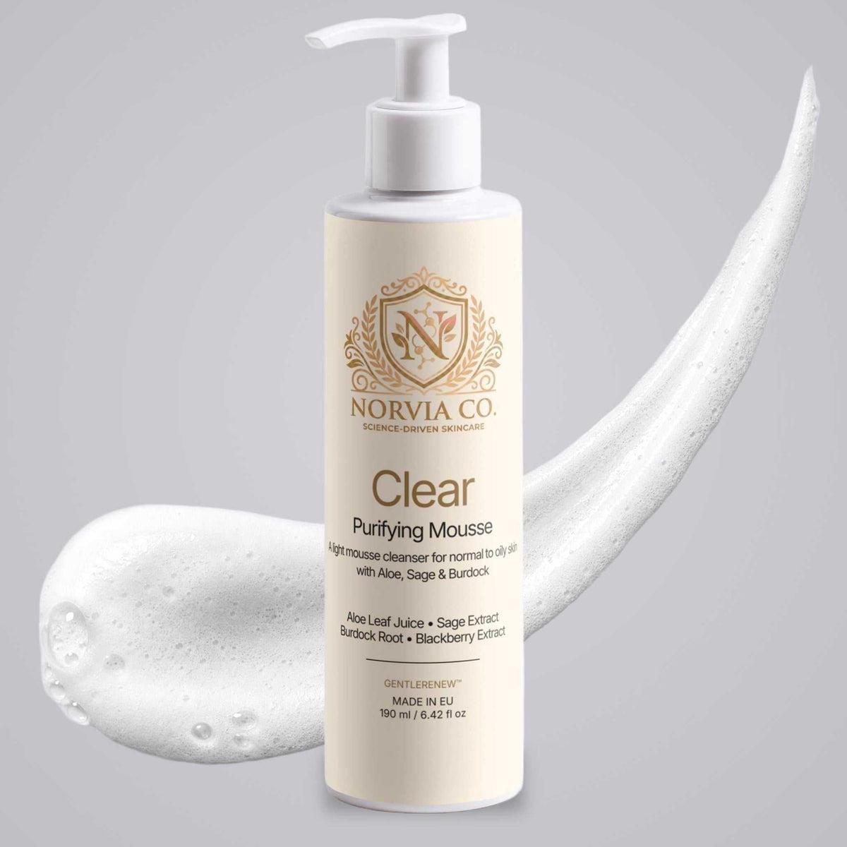 Foam Cleanser for Oily Skin in a cream pump bottle with gold lettering, shown with a white airy mousse swirl.