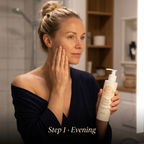 Gel Cleanser for Oily Skin in a cream pump bottle with a clear gel formula, held beside a woman’s face