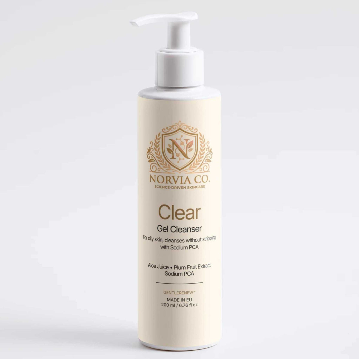 Gel Cleanser for Oily Skin in a cream-colored pump bottle with gold lettering and a white dispenser