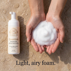 Gentle Foaming Cleanser in a white pump bottle beside a fluffy foam lather held in cupped hands