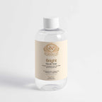 Glycolic Acid Toner in a clear bottle with a white cap and cream label featuring gold Norvia branding