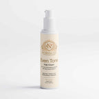 Kojic Acid Cream in a slim ivory pump bottle with gold Norvia branding and Even Tone labeling