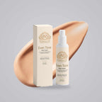 Kojic Acid Cream in a white pump bottle beside a matching cream box, both with elegant gold branding.