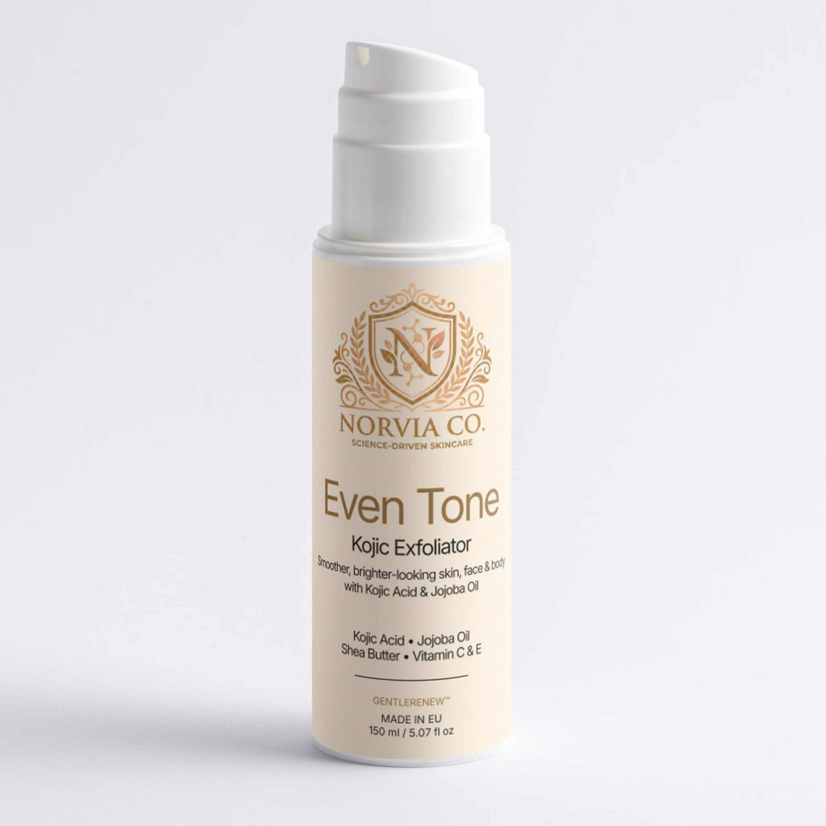 Kojic Acid Scrub in a cream-colored pump bottle with gold Norvia branding and Even Tone Kojic Exfoliator label