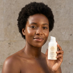 Moisturizer for Dehydrated Skin in a cream-colored pump bottle, held beside a woman’s face, with gold label details