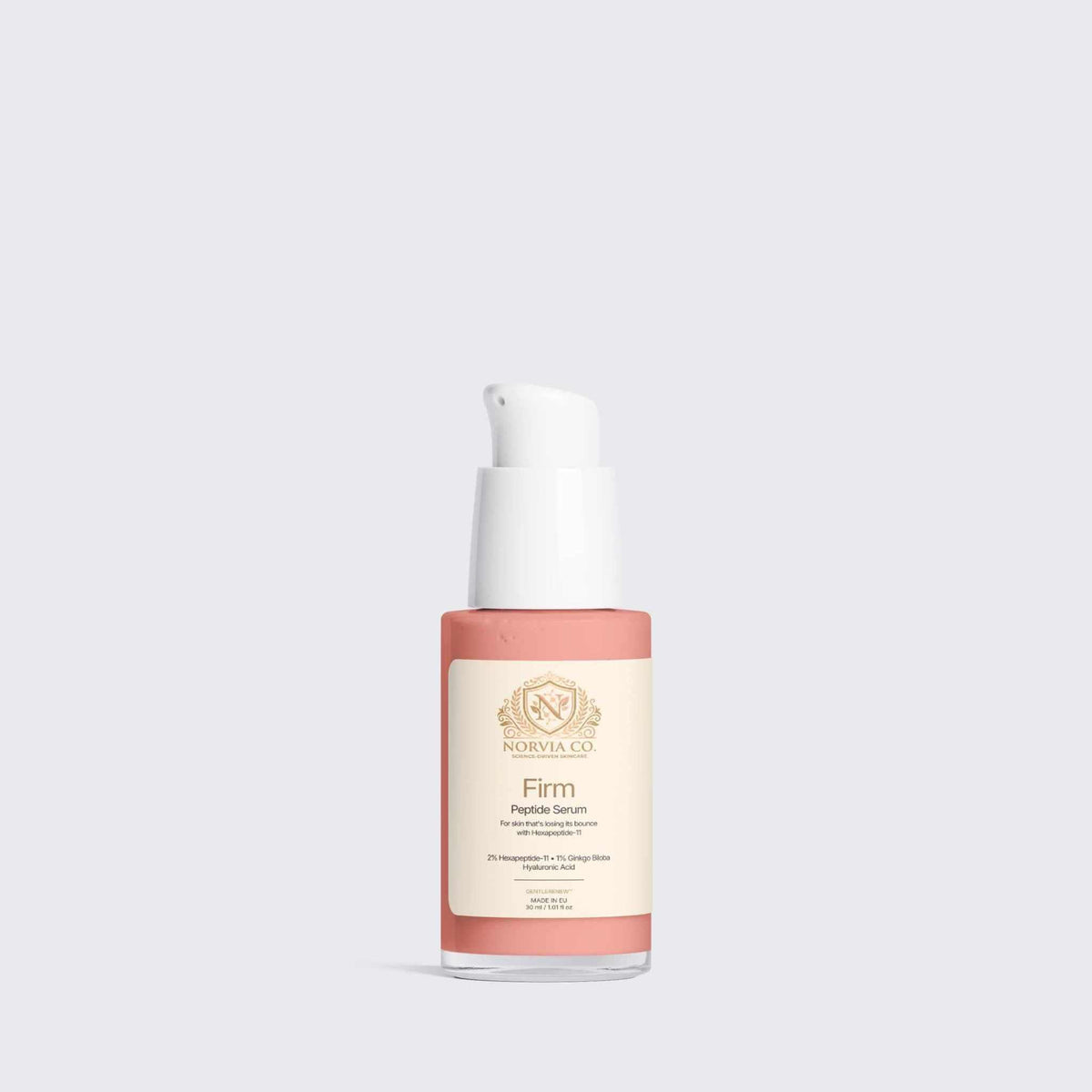 A bottle of Morinda Co Firm Peptide Serum with a white pump dispenser and a label showing a coral pink color, set against a solid light gray background.