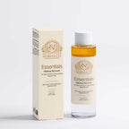 Skin Care Routine Kit featuring a clear, amber two-phase makeup remover bottle and matching cream-colored box with gold detailing