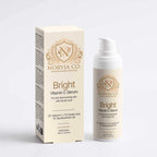 Vitamin C Serum in a cream-colored bottle and matching box, featuring gold Norvia branding and Bright label